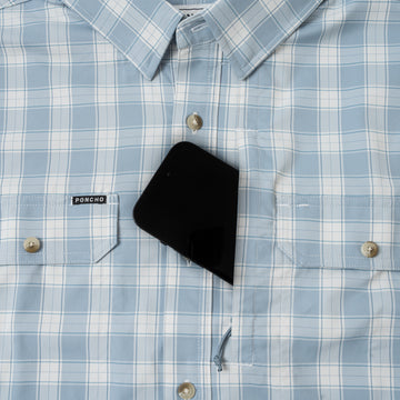 phone in chest zipper pocket of shirt