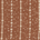 Close-up of brown fabric with white star and dot pattern in vertical stripes