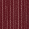 Deep red fabric with vertical white dotted and star-like stitch patterns