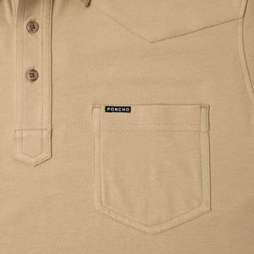 pcoket and buttons of yellow/tan polo shirt