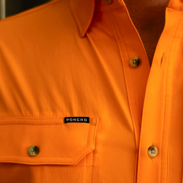 man wearing the first and goal shirt