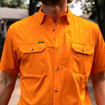 man wearing the first and goal shirt