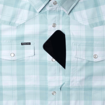 The Billings light green plaid outdoor shirt with snap buttons and chest pockets holding a phone