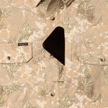 phone in chest zipper pocket of shirt