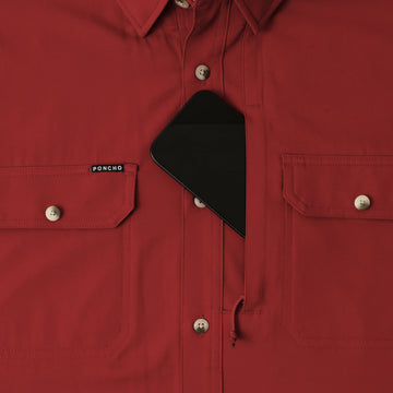 phone in chest zipper pocket of shirt