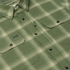 detail photo of green and white plaid flannel
