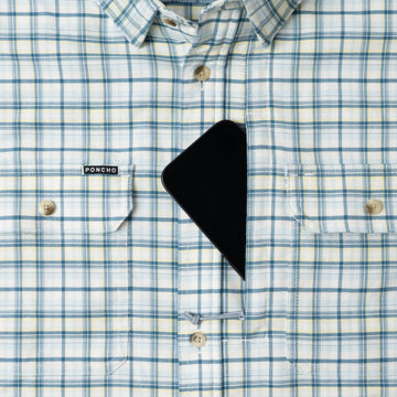 phone in chest zipper pocket of shirt