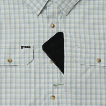 phone in chest zipper pocket of shirt