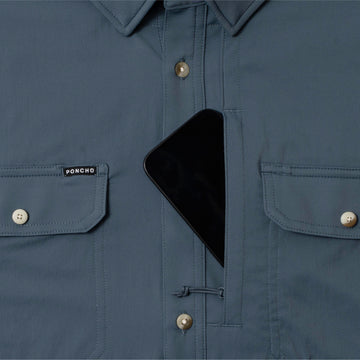 photo of shirt with phone in zipper pocket