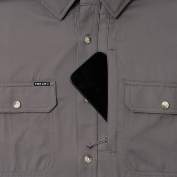 photo of shirt with phone in zipper pocket