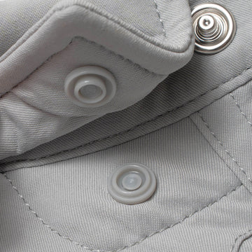 collar snaps on grey shirt