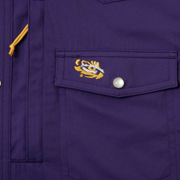 closeup of LSU logo on pocket of shirt