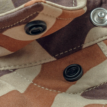 closeup of collar snaps on camo shirt