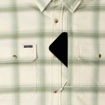 phone in chest zipper pocket of shirt