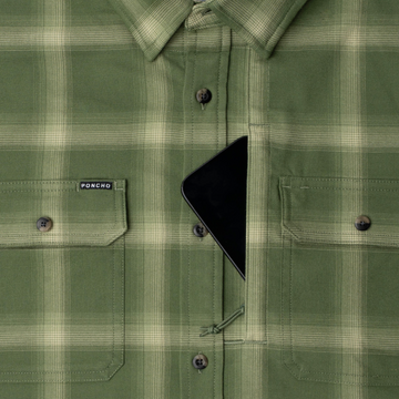 phone in chest zipper pocket of shirt