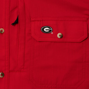 Closeup of Georgia logo on pocket of shirt