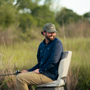 Man smiling while fishing