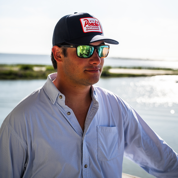 Man on the Coast wearing The Home Base Hat
