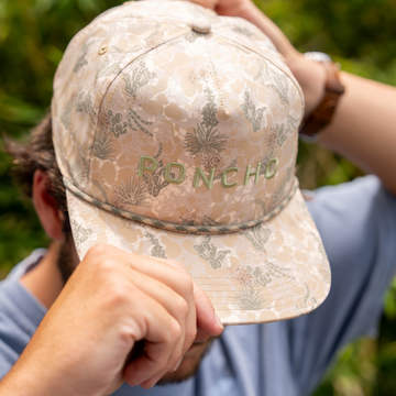 Top view of man wearing the Long Range hat