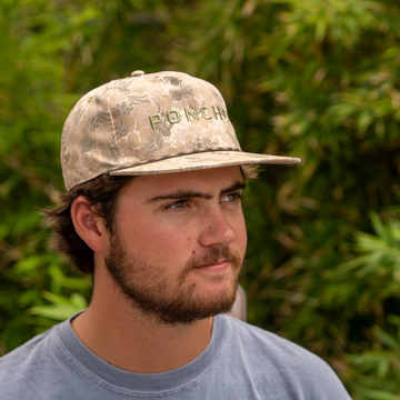 man wearing the long range hat