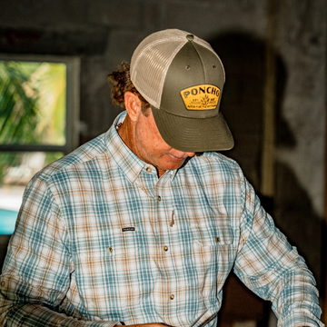 Top down view of man wearing The Moss Agave Trucker Hat