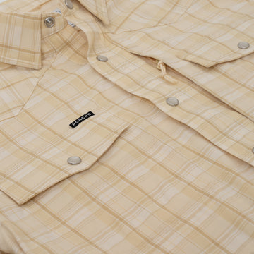 Close-up of The Sweetwater beige plaid outdoor shirt with snap buttons and chest pockets