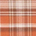 Orange, red-brown, and tan plaid fabric pattern with intersecting lines