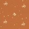 Brown fabric pattern with small white floral designs scattered evenly