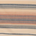 Close-up of fabric with horizontal blue and beige stripes resembling a traditional woven pattern