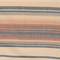 Close-up of fabric with horizontal blue and beige stripes resembling a traditional woven pattern