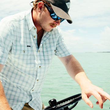 man wearing the 10 weight shirt