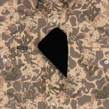 phone in chest zipper pocket of shirt