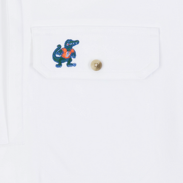 Logo on the chest pocket of the shirt