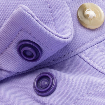 Closeup of collar snaps on collar of shirt