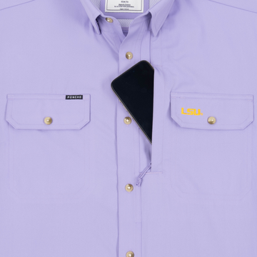 Phone in chest zipper pocket of shirt