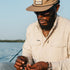 Man on water tying lure
