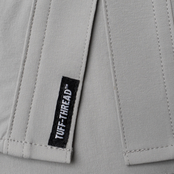 Tuff Thread tag on the bottom of the shirt