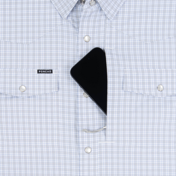 Phone in chest zipper pocket of shirt