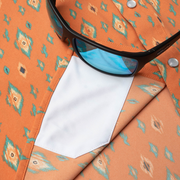 sunglasses with lens cleaner on shirt