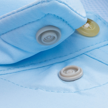 Closeup of collar snaps on shirt