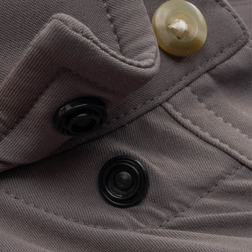 Closeup of collar snaps on collar of shirt