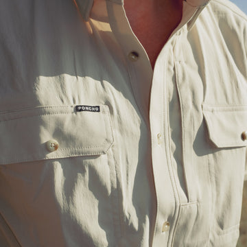 man wearing the brown bear shirt
