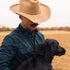 man with dog wearing the cascade flannel