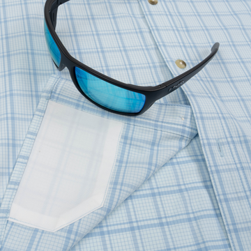 sunglasses with lens cleaner on shirt
