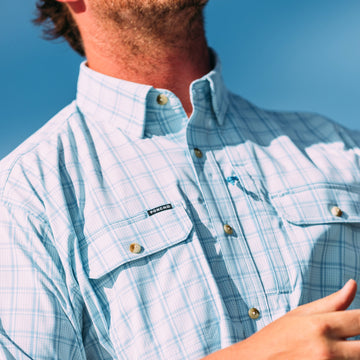 man wearing the charlotte harbor shirt