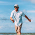 man fishing wearing the charlotte harbor shirt
