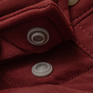 Closeup of collar snaps on collar of shirt
