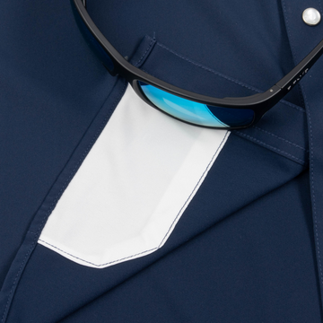 Closeup of sunglasses with lens cleaner on shirt