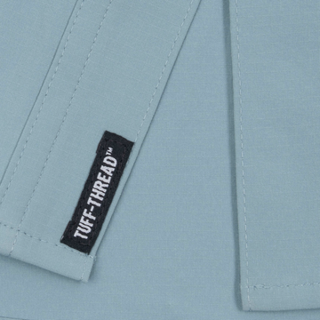 closeup of tuff-thread tag on shirt