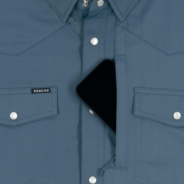 phone in chest zipper pocket of shirt